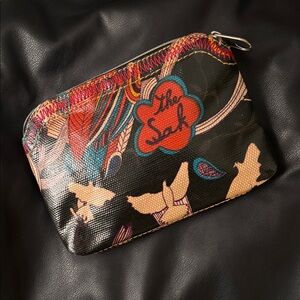 The Sak Colorful Coated Canvas “Peace” Zippered Pouch